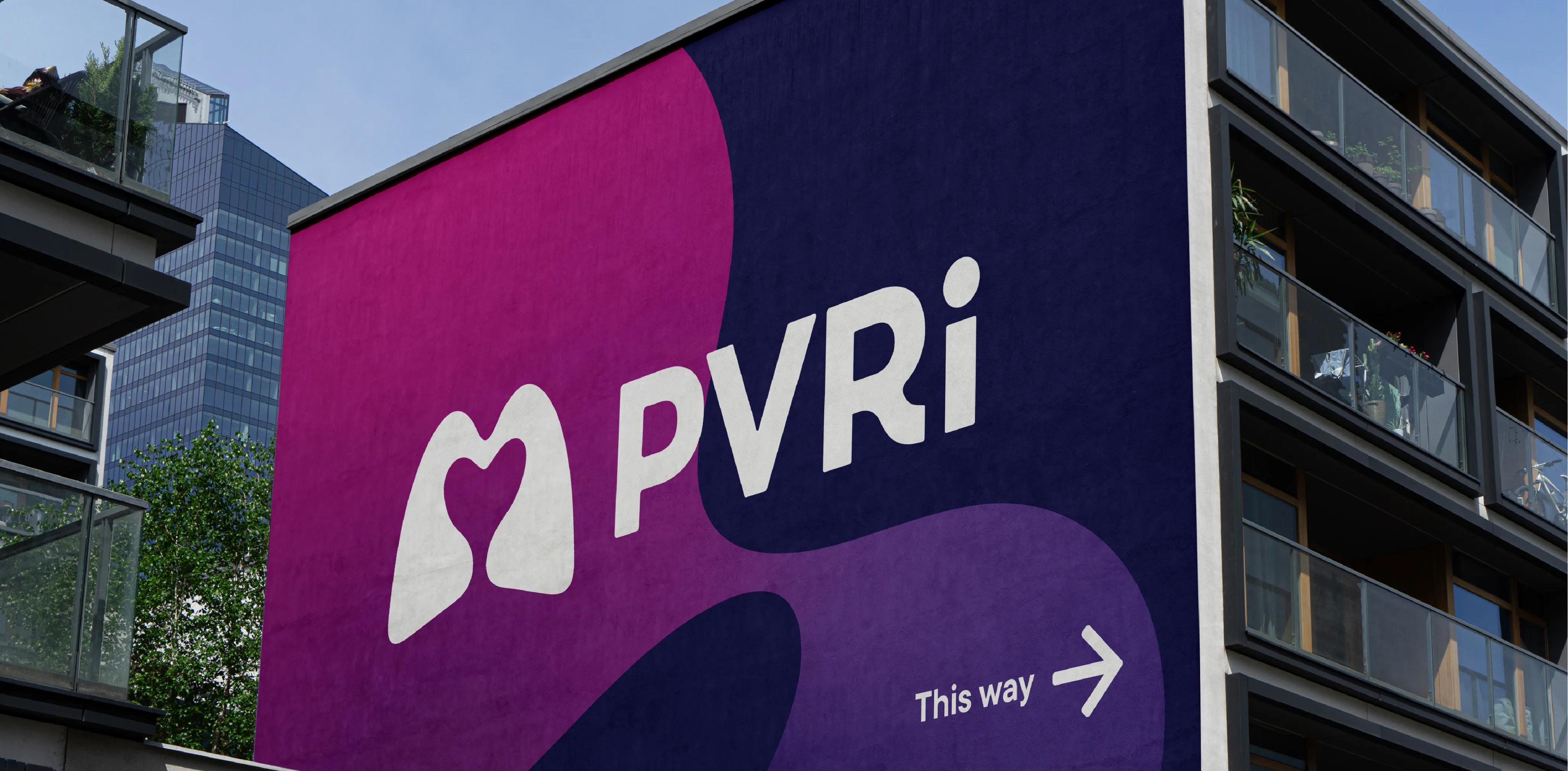 PVRI mural showing the logo and signage to the conference