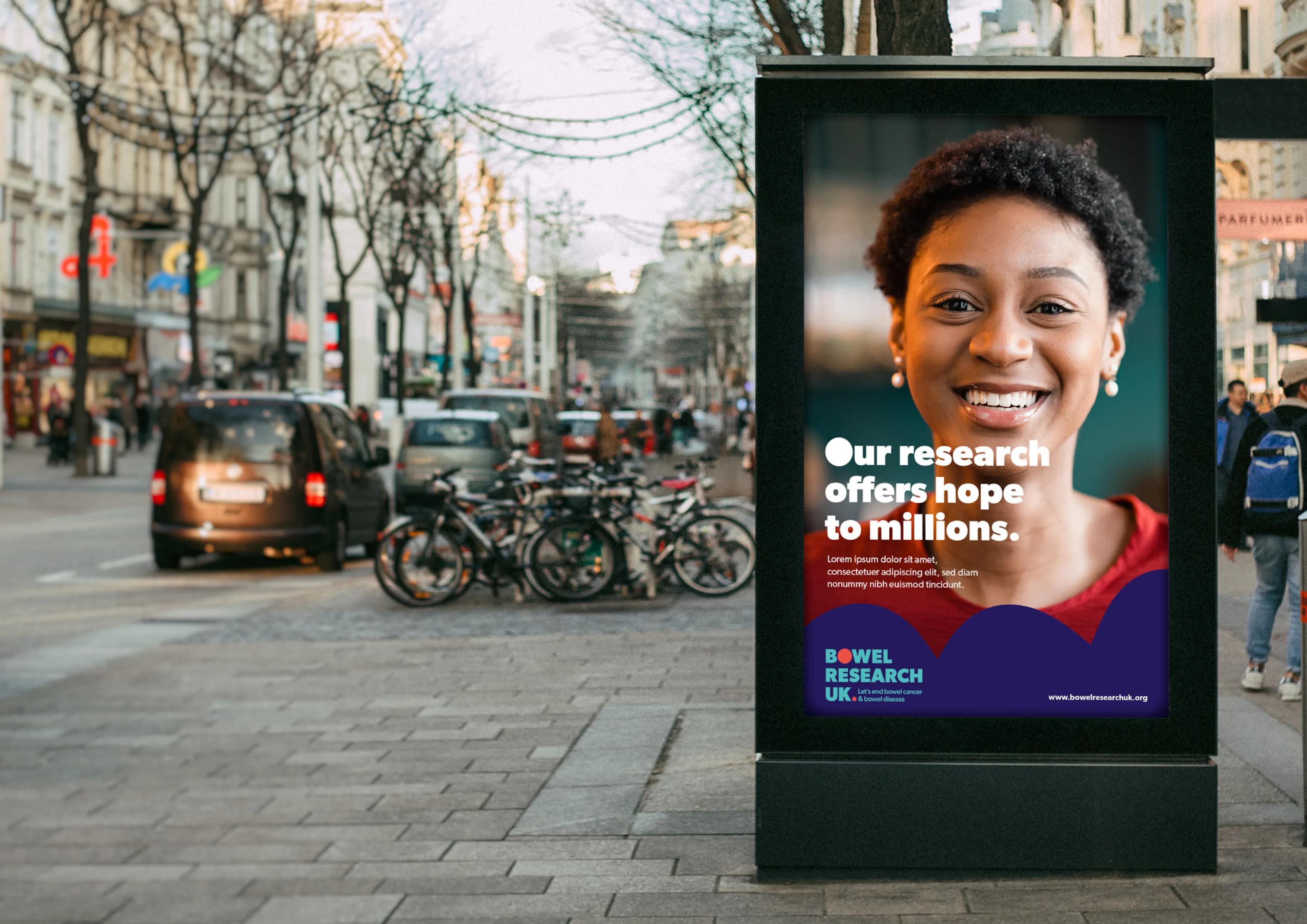 Billboard outside with the caption 'our research offers hope to millions'