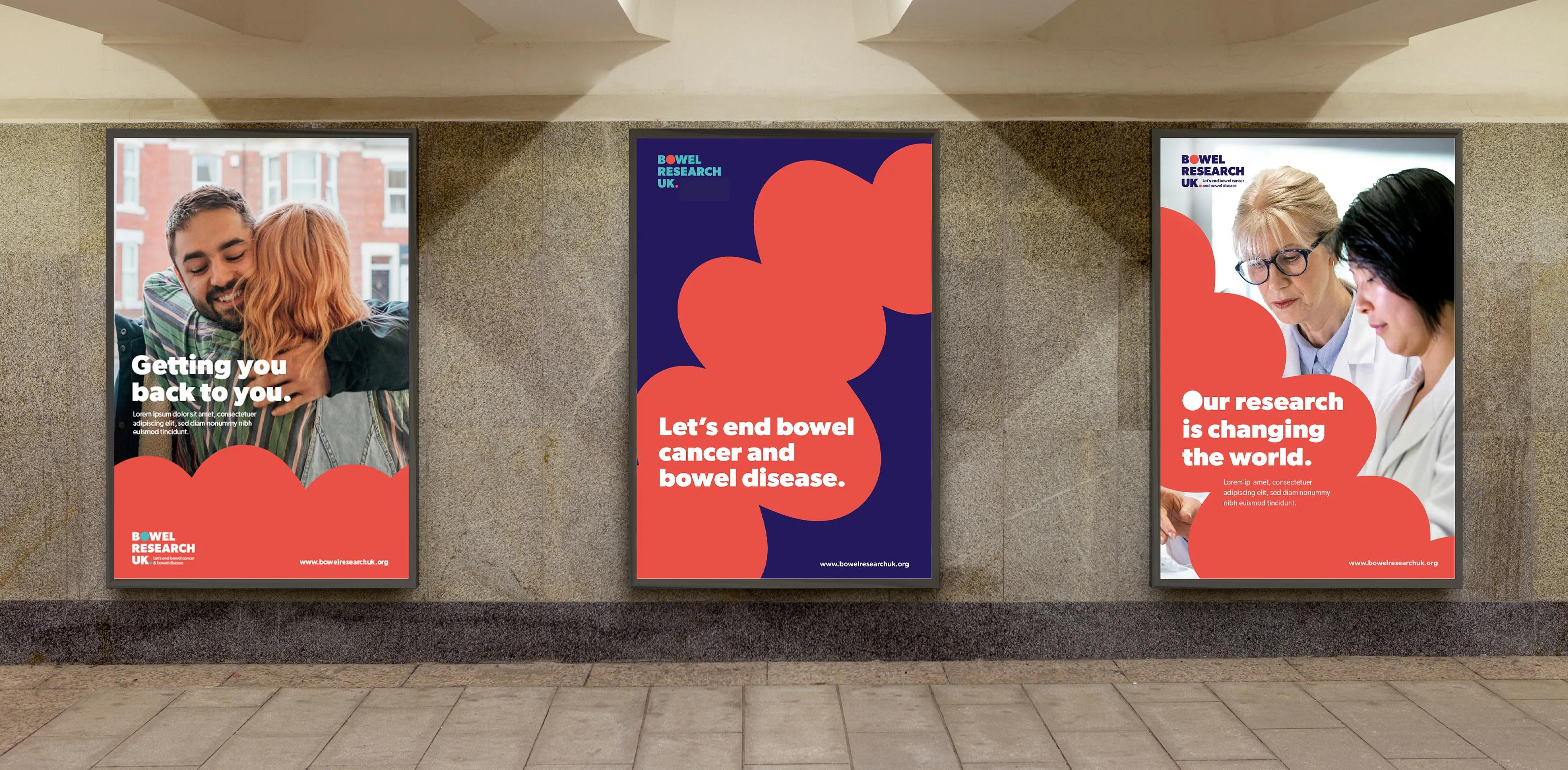 Set of three bowel posters on display on the underground station