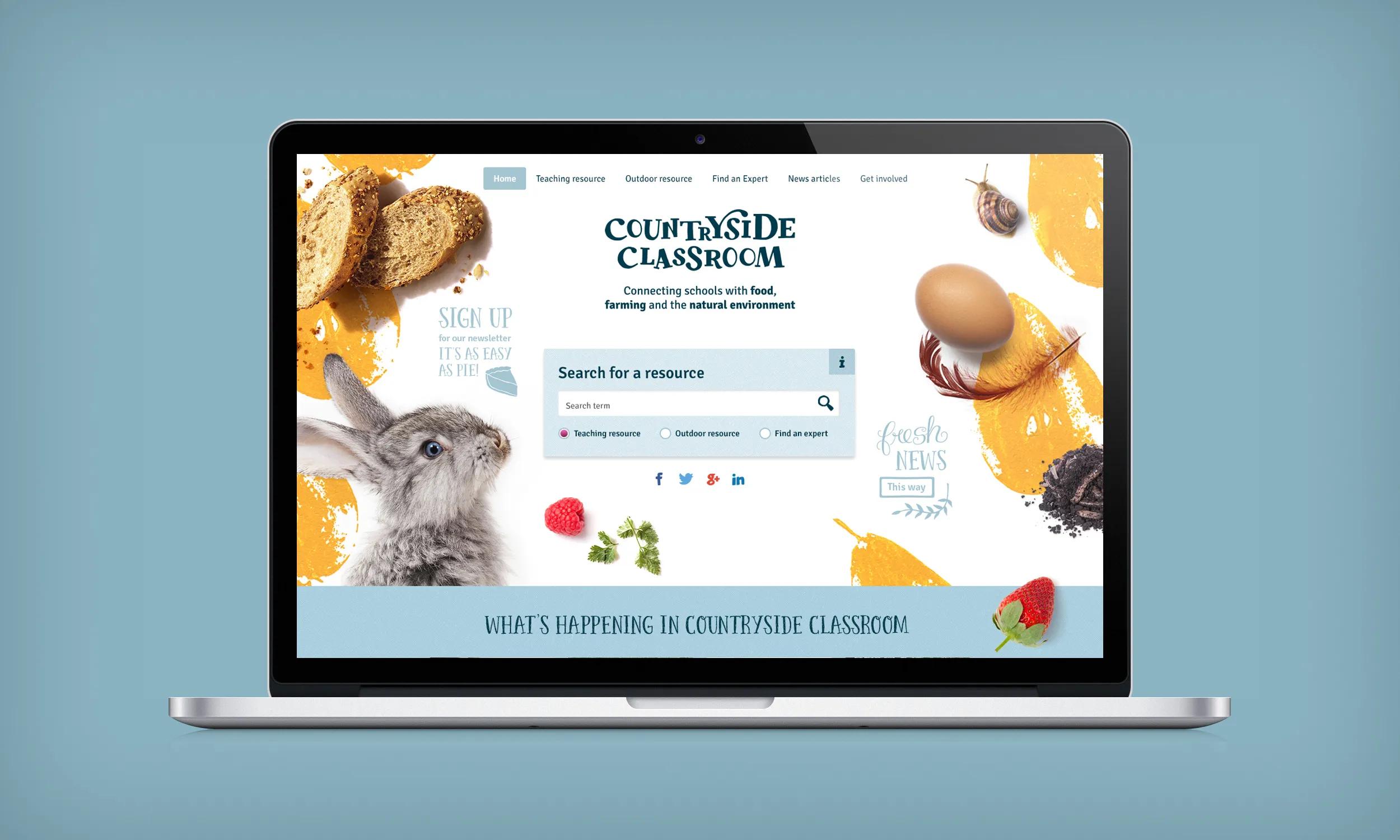 Homepage of website displayed on a laptop