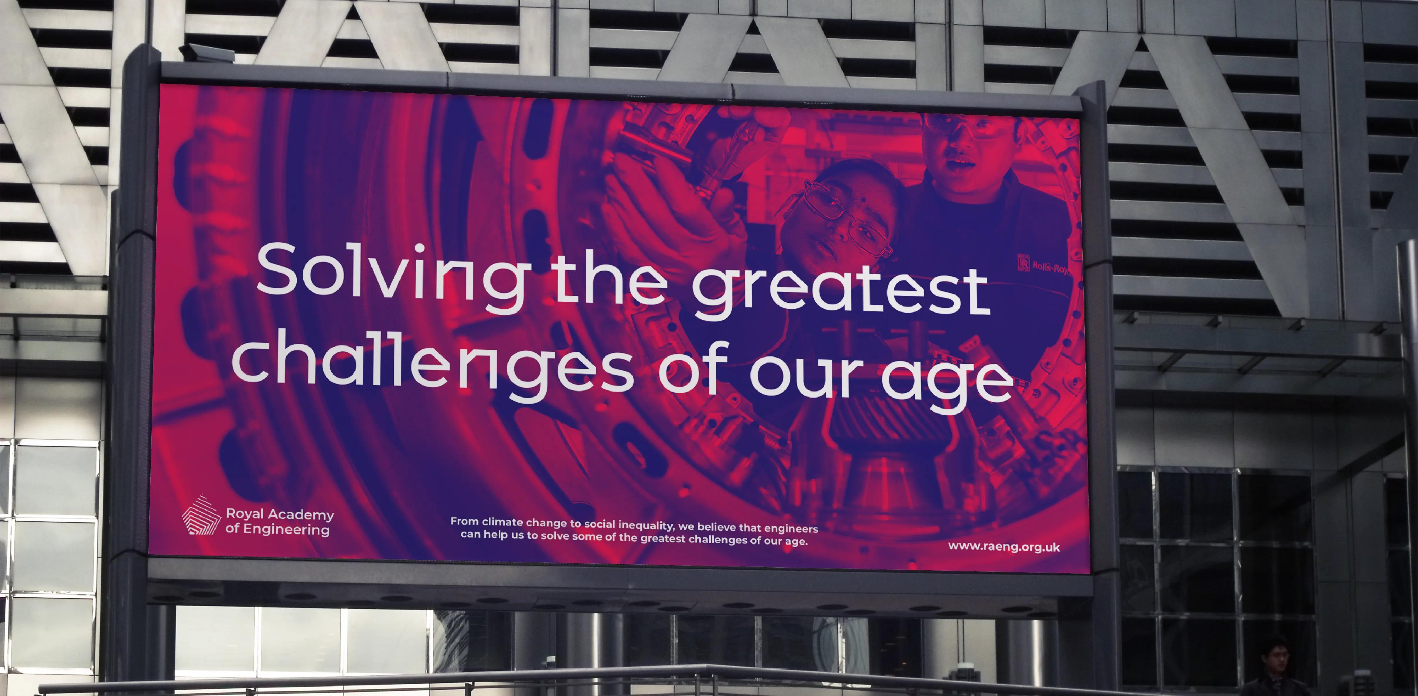 Billboard that says 'Solving the greatest challenges of our age'