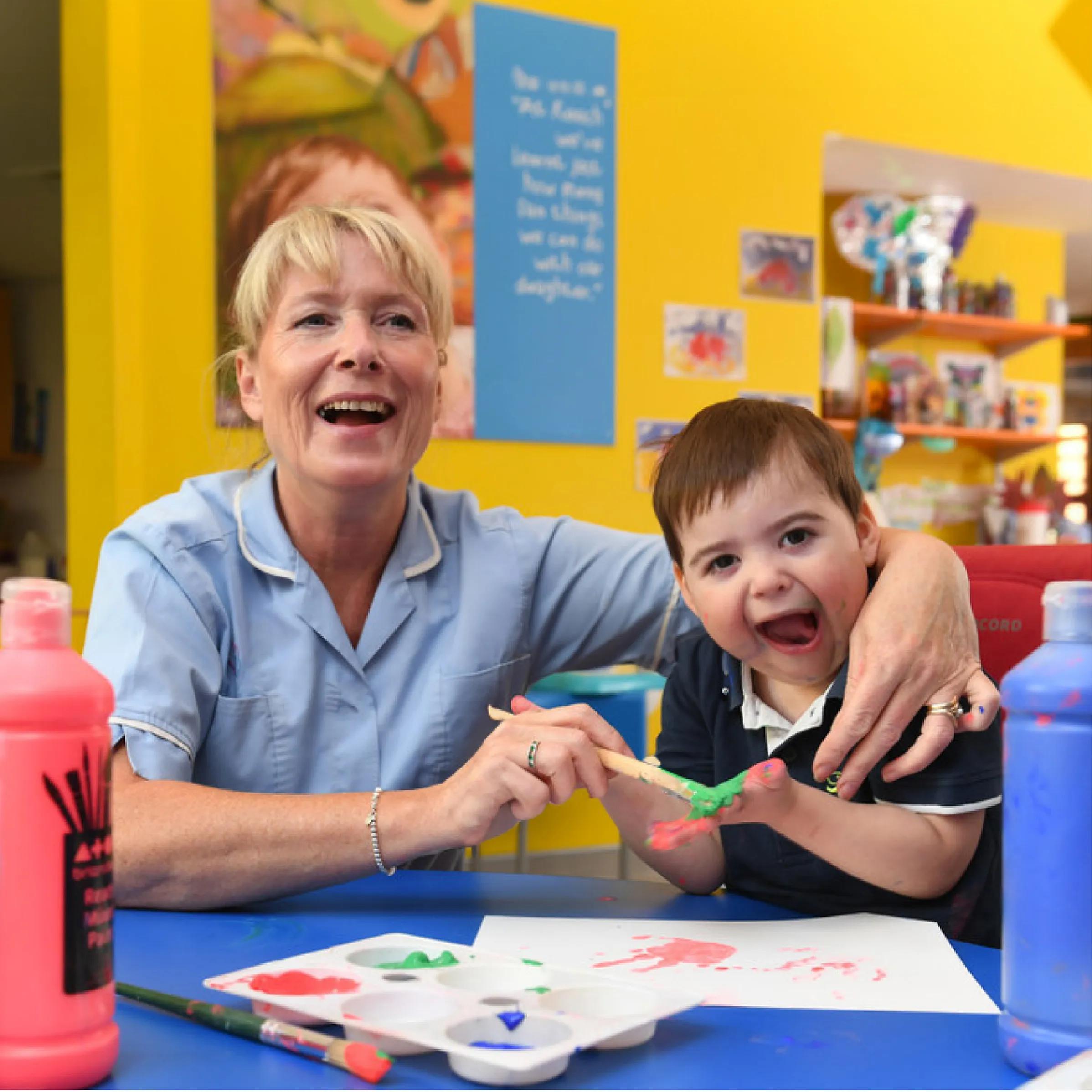 nurse playing with one of the child patients