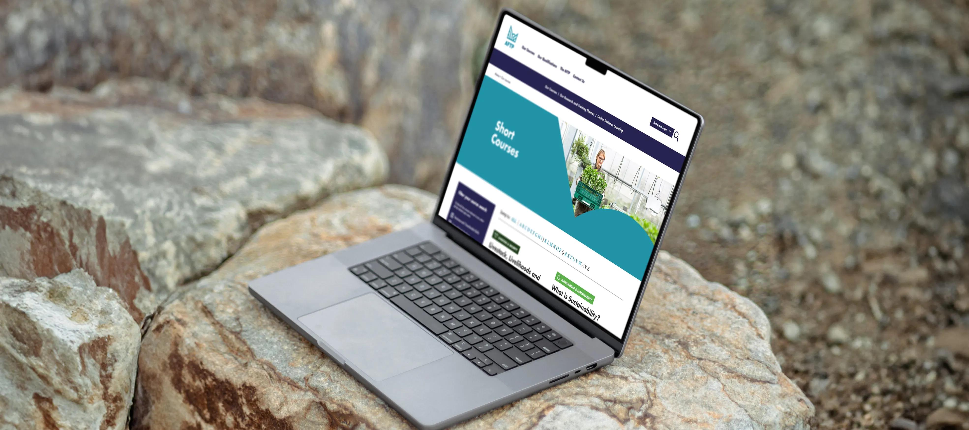 Website shown on the laptop 
