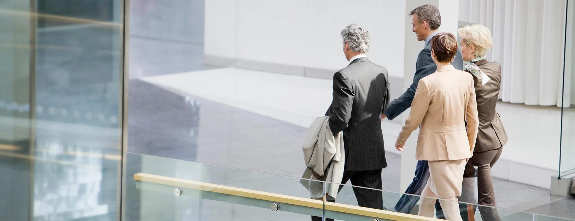 solictors walking down a corridor