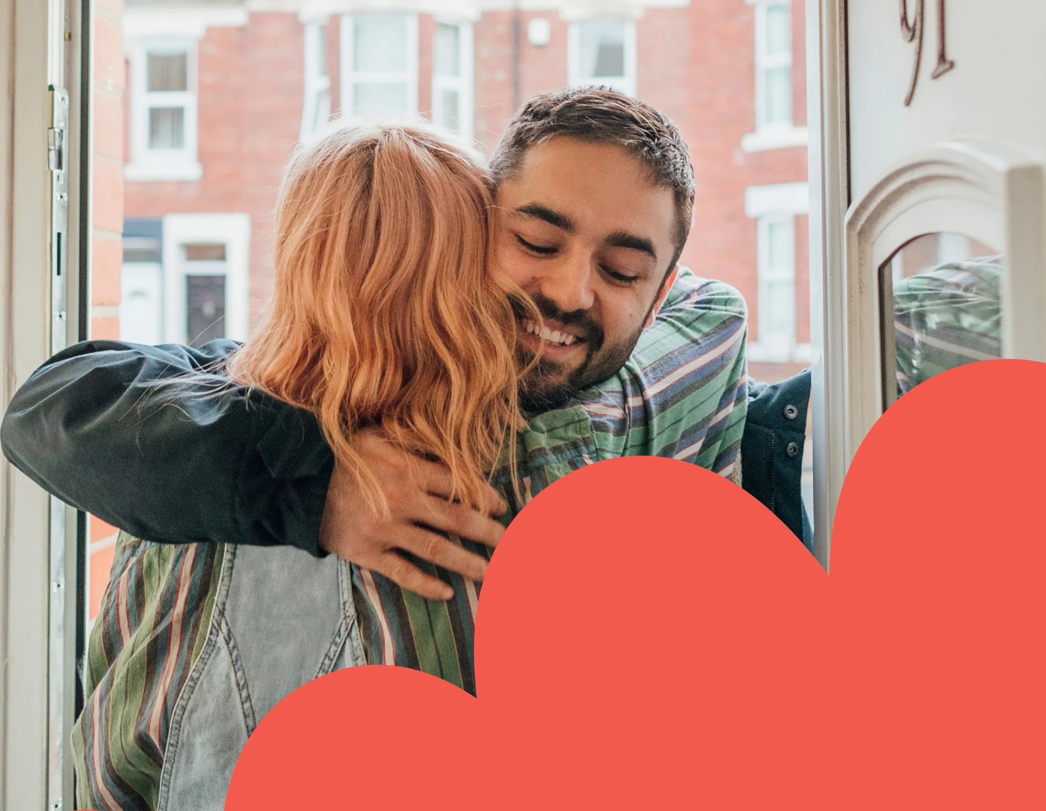 man hugging a woman